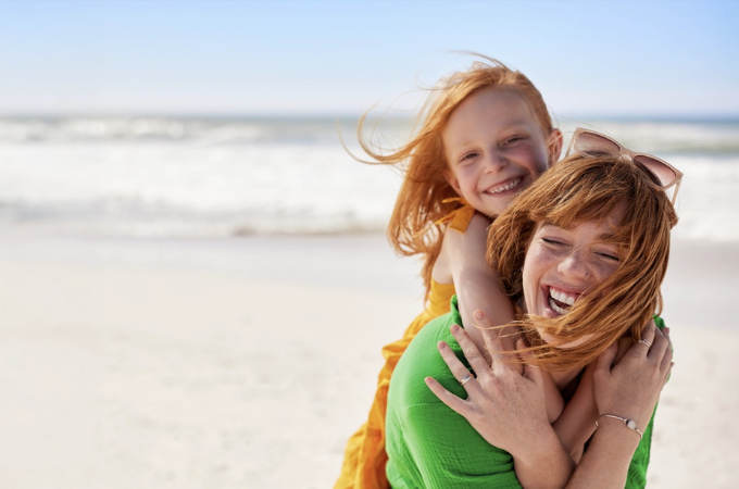 mom and child smiling